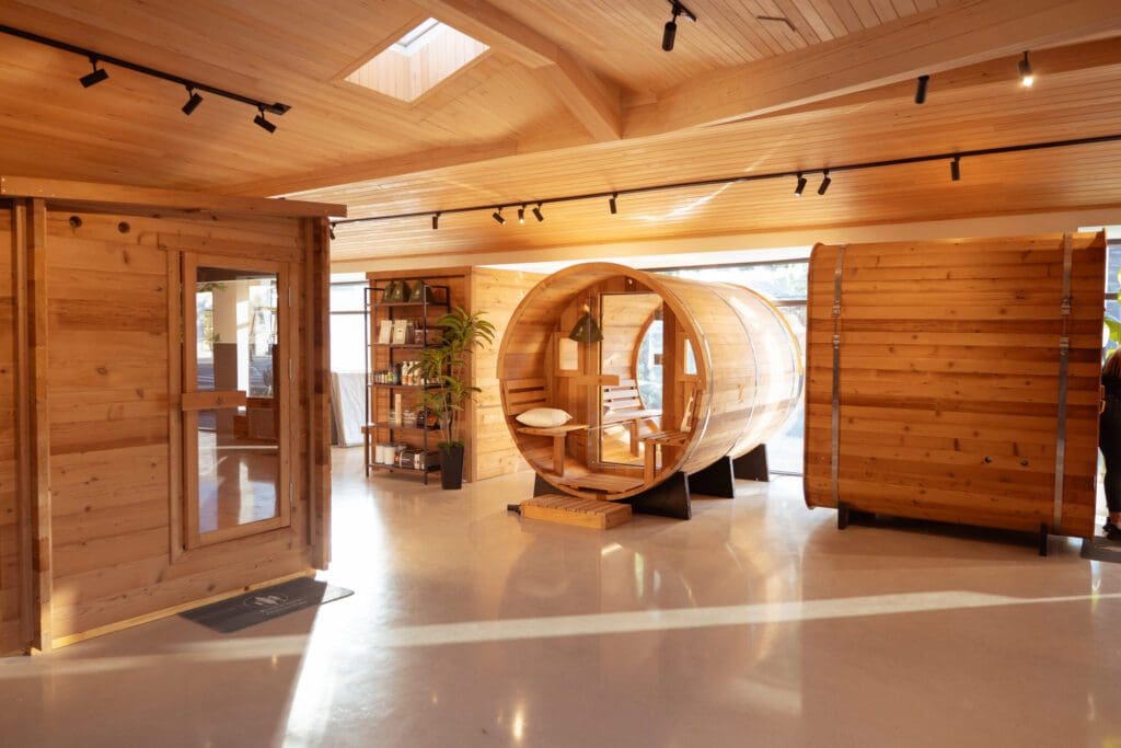 Wooden sauna room with circular design.