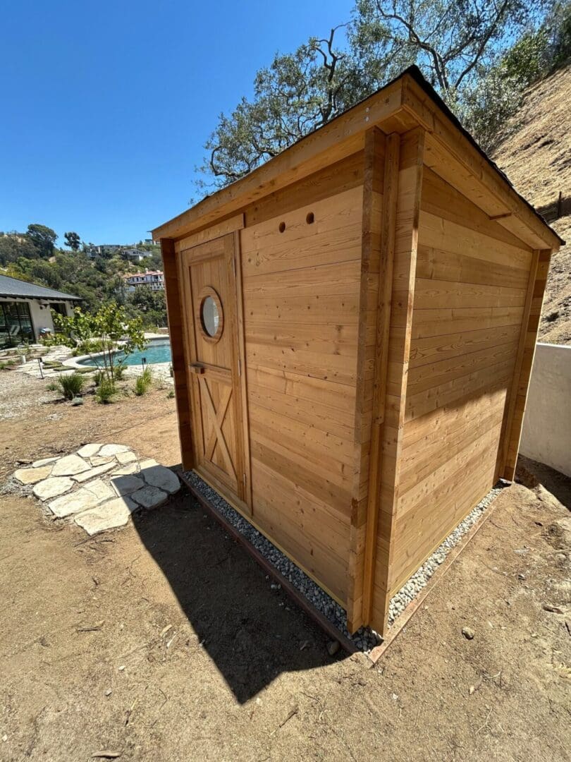 Luxury outdoor sauna cabin featuring premium cedar construction and wellness-focused design